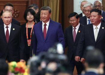 Çin'deki askeri geçit törenine katılan Kim, ilk kez çok taraflı diplomatik bir etkinlikte yer aldı